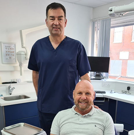 Professor Julian Yates with implant patient Iain Cotterill
